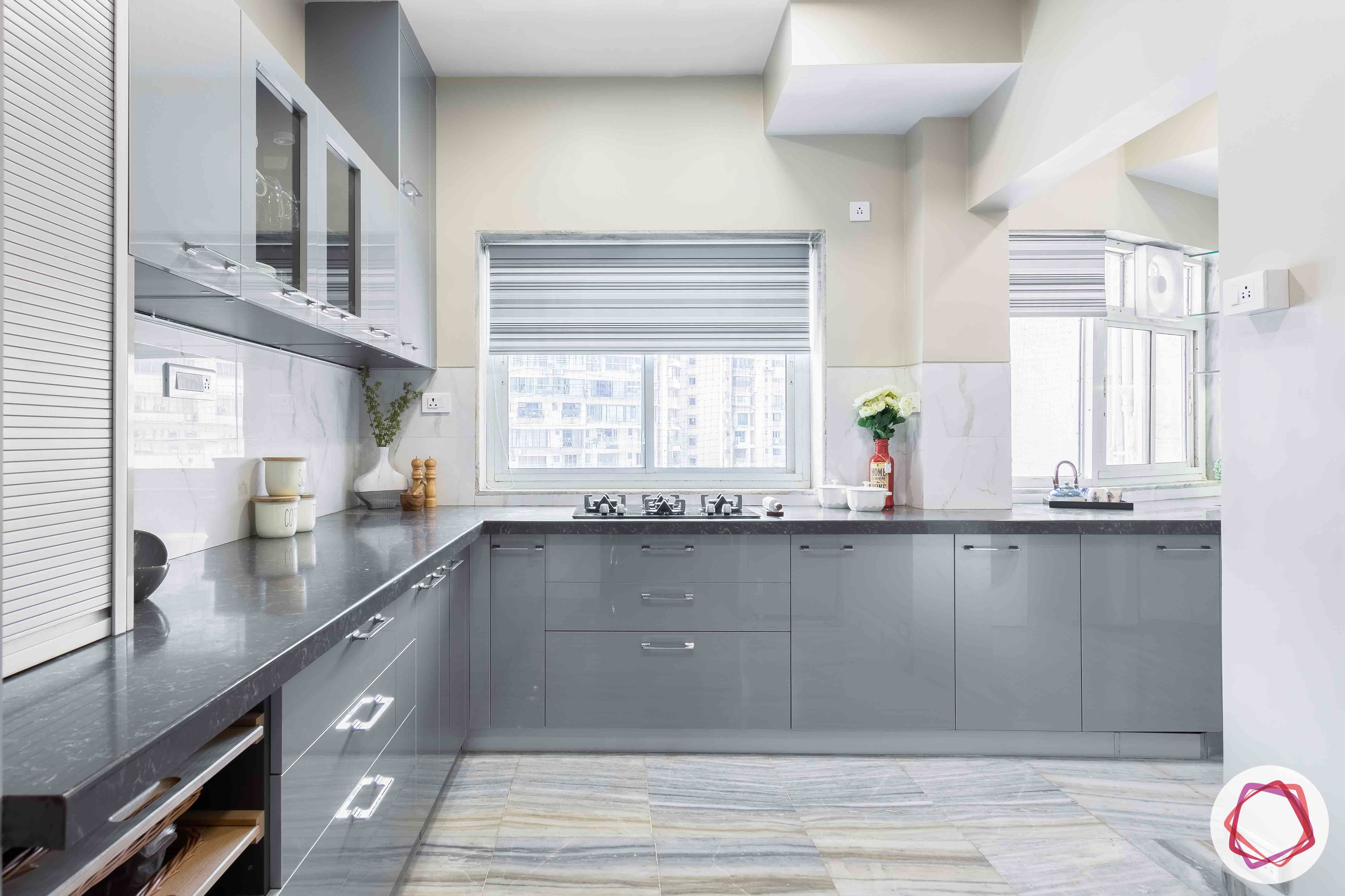 kitchen-base-grey-cabinets-window-counter-flooring-blinds