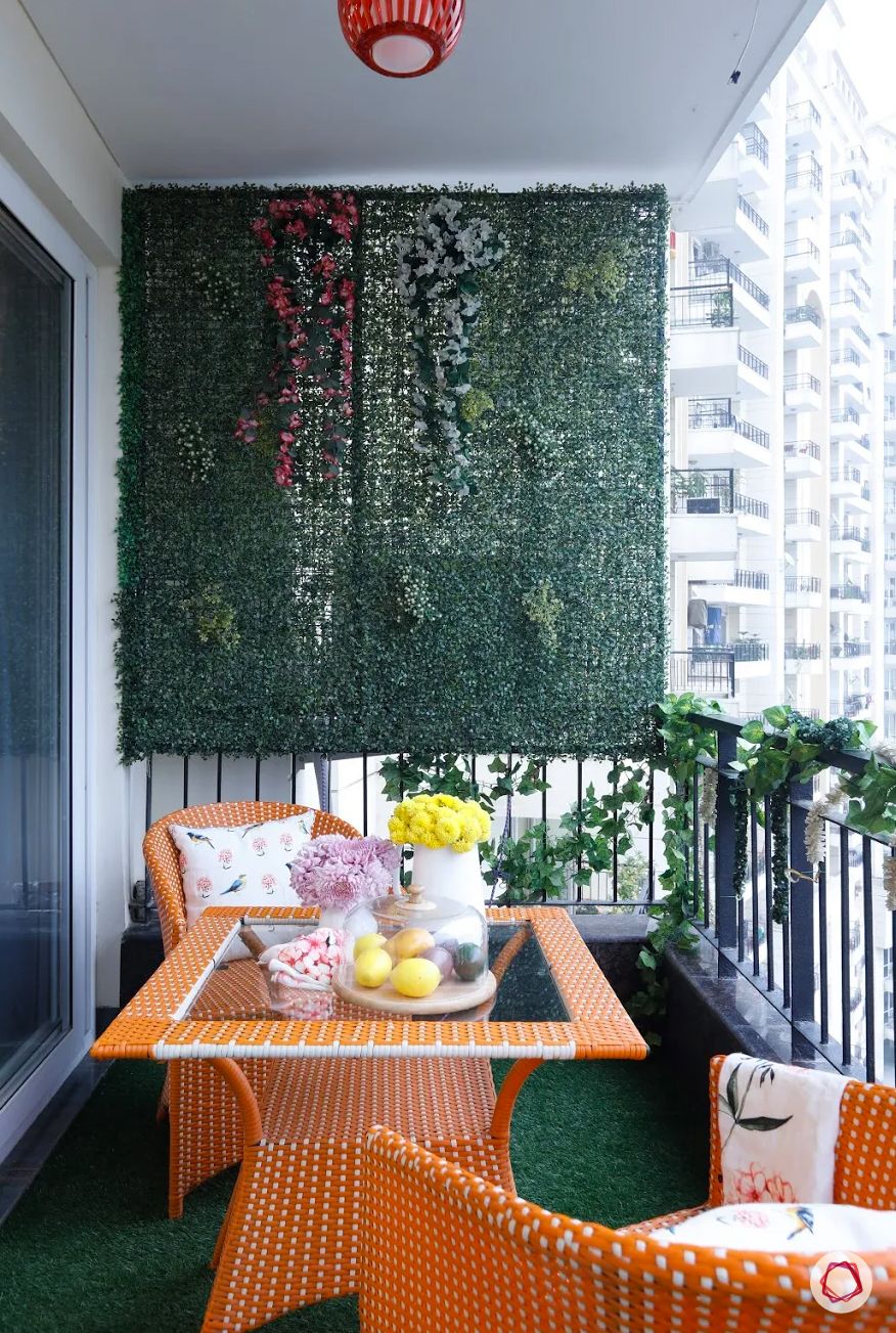 balcony garden-Orange furniture-yellow and pink flower pots