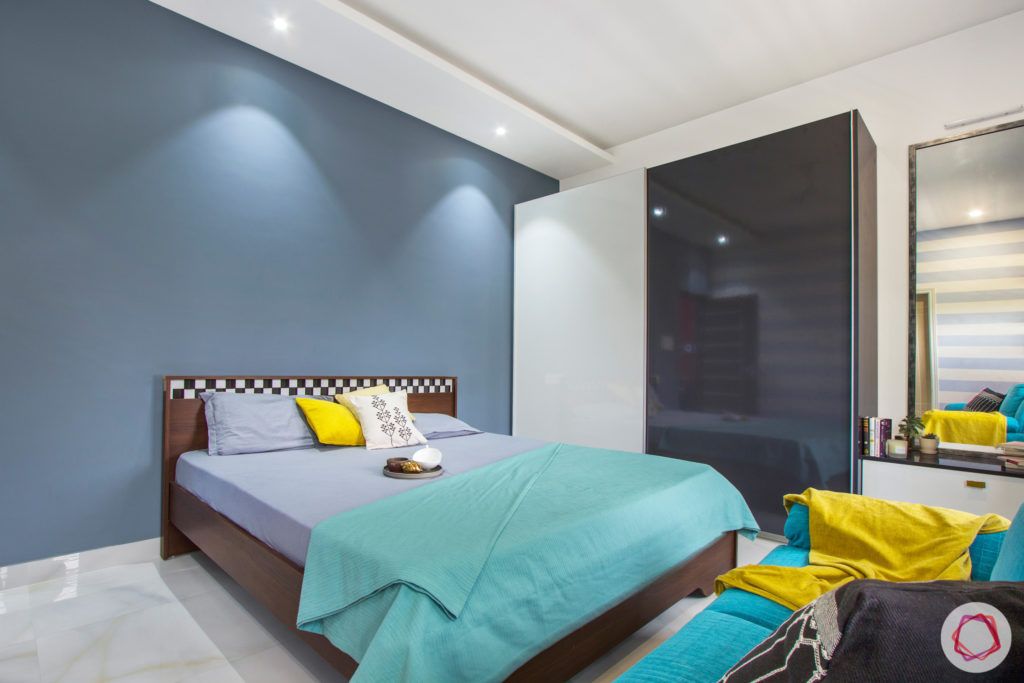 duplex house design-blue wall designs-sliding wardrobe designs