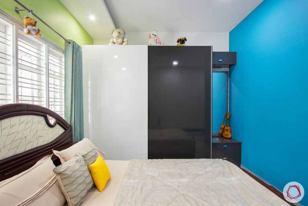 duplex house design-blue wall designs-sliding wardrobe designs