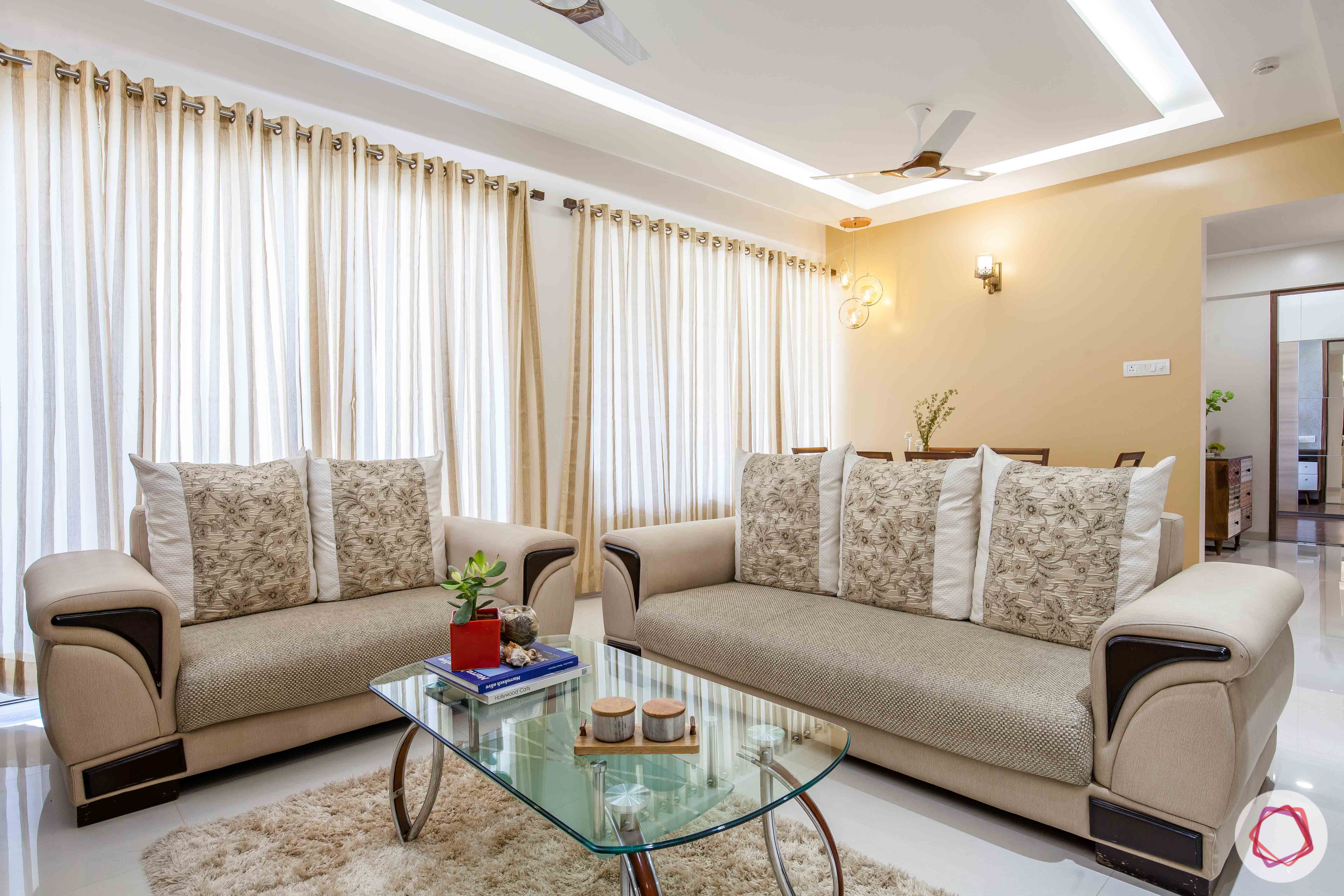 kunal-aspiree-living-room-curtains-centre-table