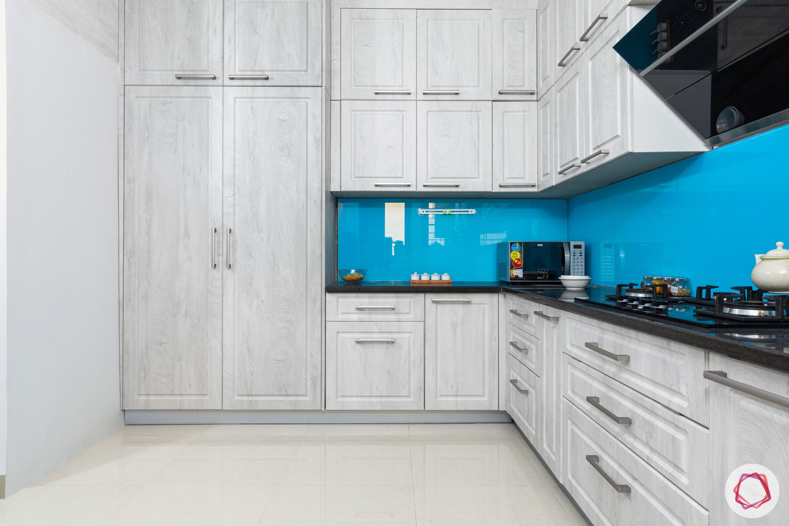 top 10 interior designers in Hyderabad-kitchen-cabinets-tall-units-white-wood