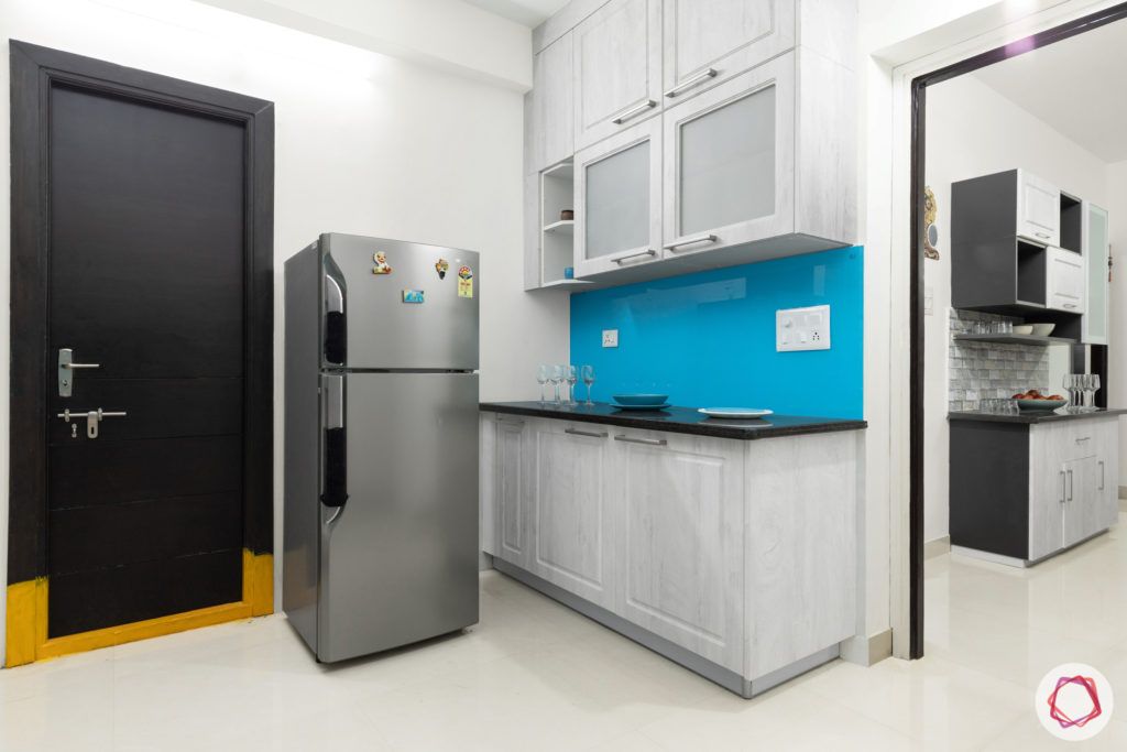 top 10 interior designers in Hyderabad-kitchen-cabinets-counter-fridge-open-shelves