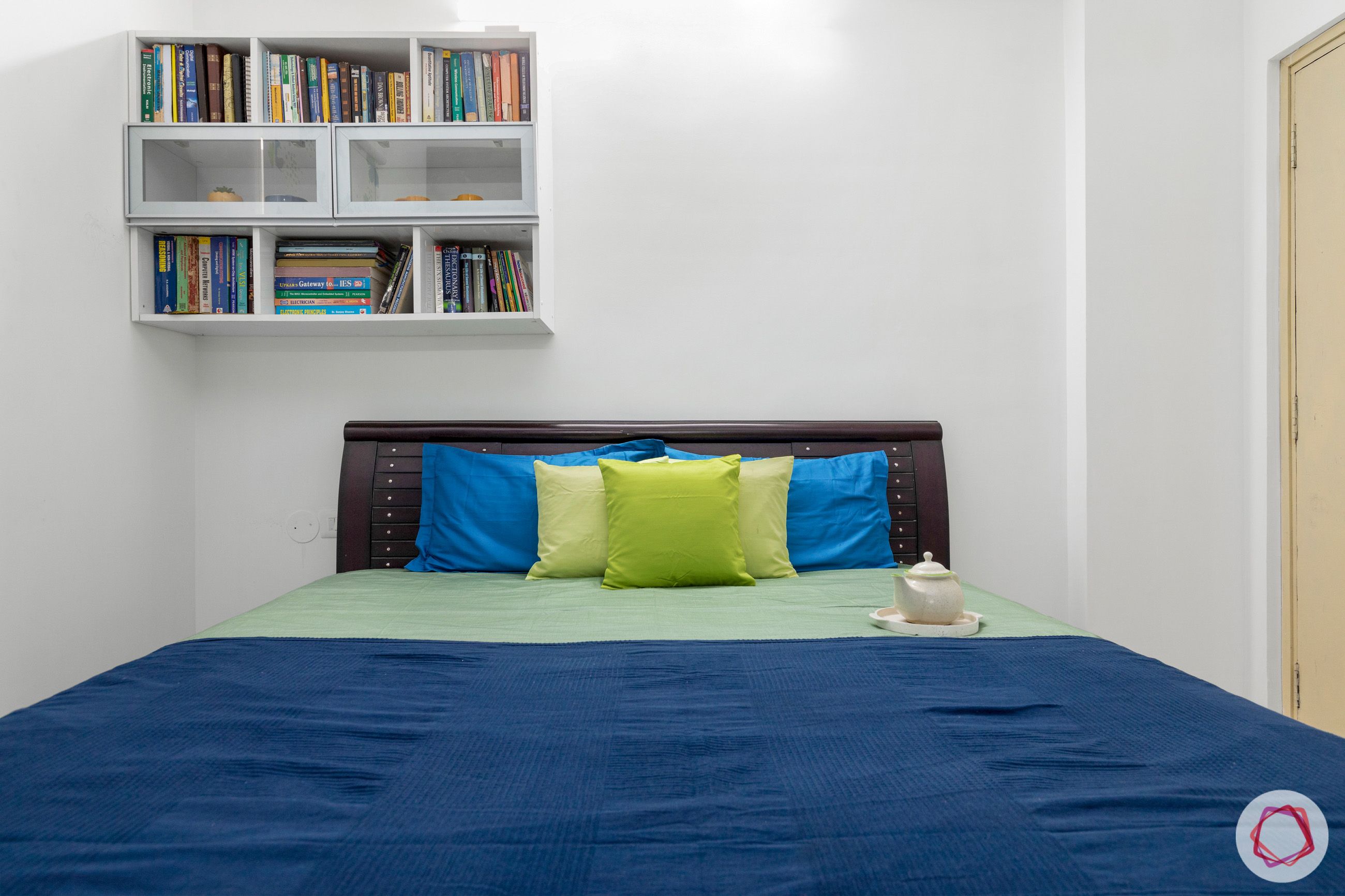 bedroom-blue-open-shelves-books-glass-shutter