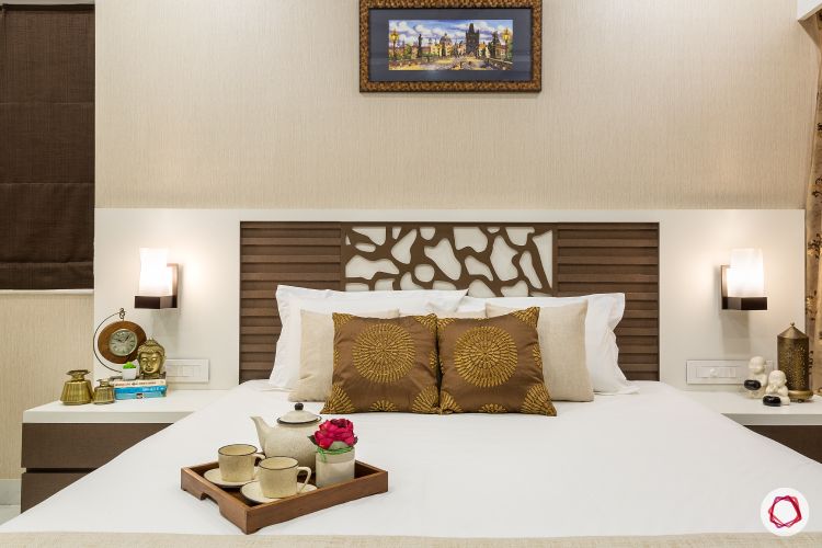 jali design- bedside sconces- brown and white bedroom design 
