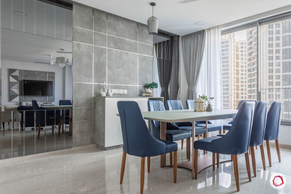 grey-blue-dining-room-table-chairs-mirror-curtains-light-fixture