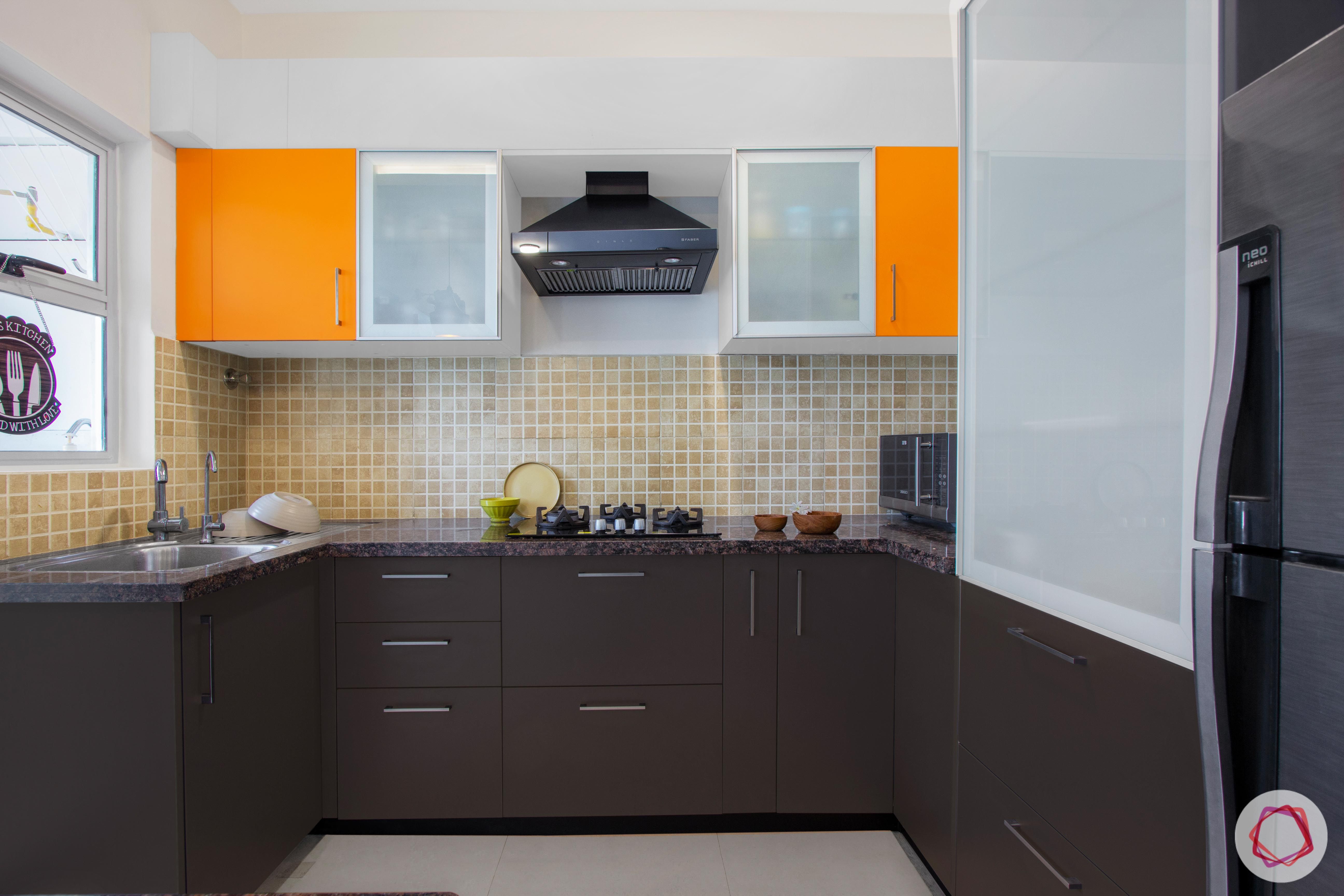nitesh hyde park-orange cabinets-brown cabinets