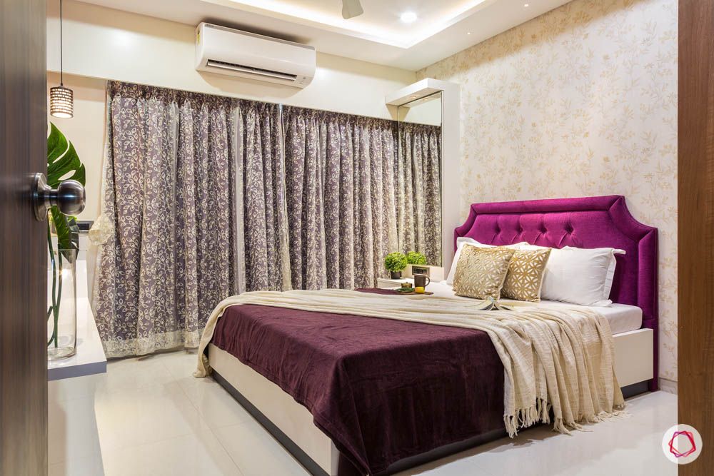 4 bhk flat in mumbai-master bedroom-purple headboard-white bed