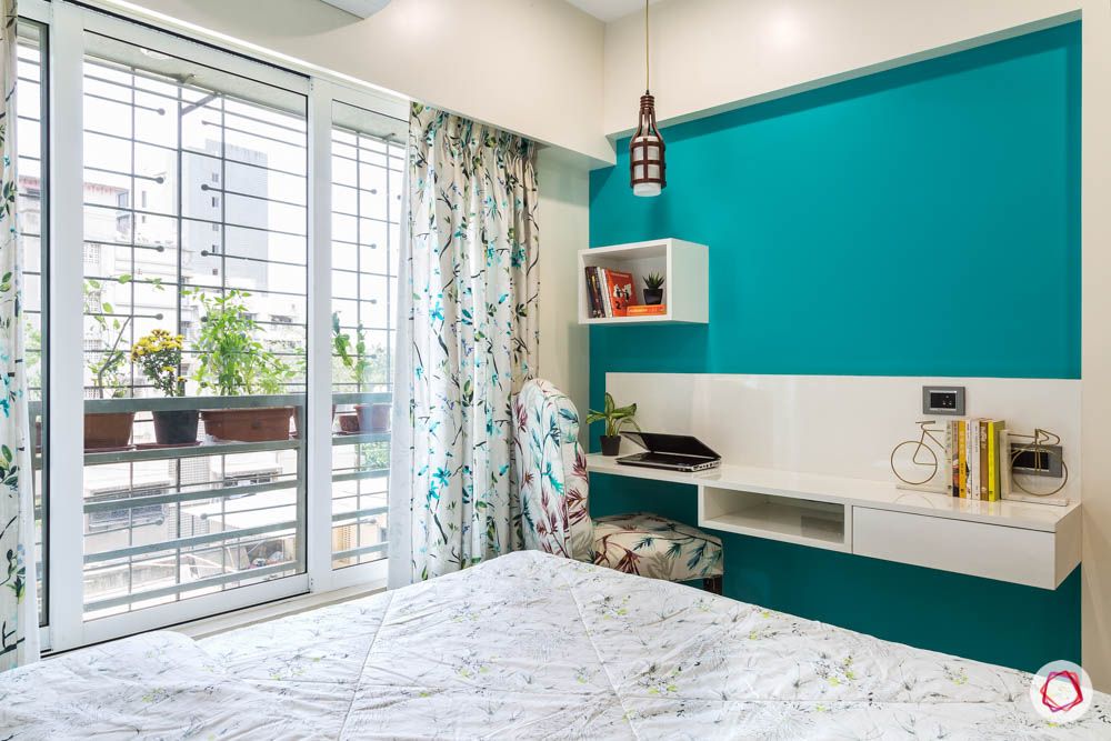4 bhk flat in mumbai-guest bedroom-tv unit-turquoise wall