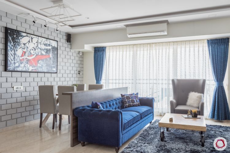 contemporary living room-grey and blue living room-blue sofa-grey chair