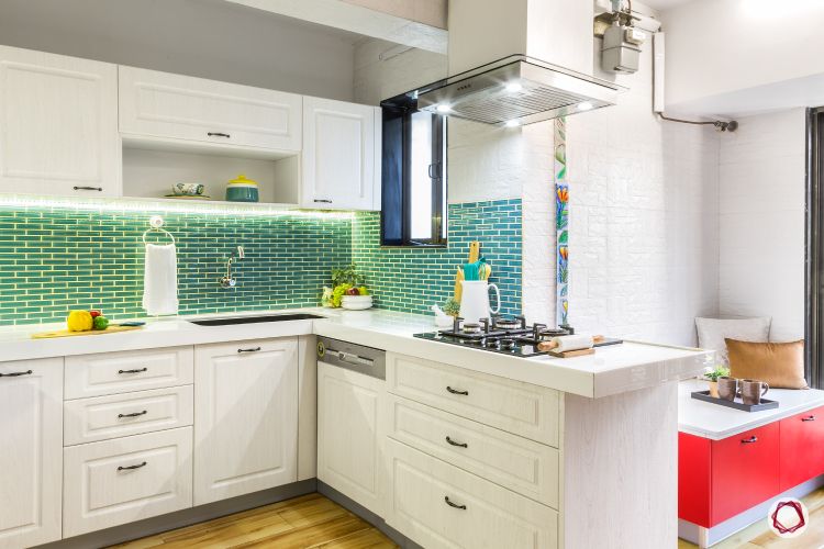 how to make a kitchen look brighter-task lights-blue backsplash-chimney lights