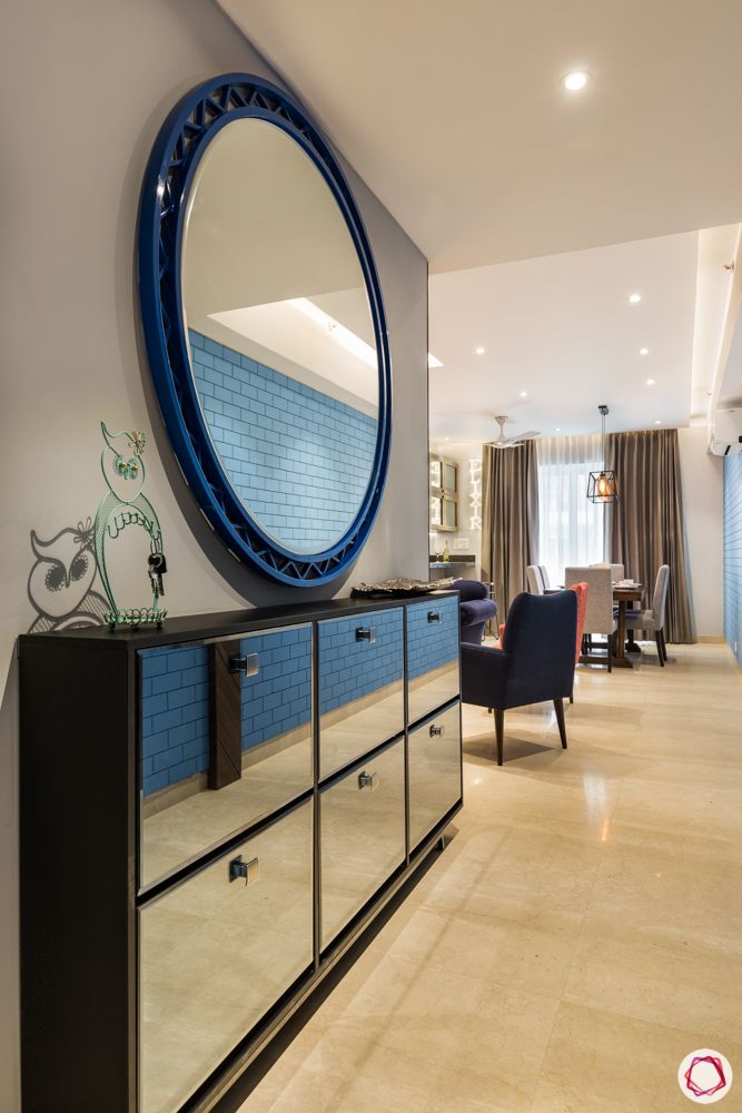 foyer-blue-exposed-brick-wall-mirror