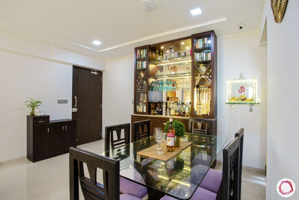 2-bhk-in-mumbai-dining room-glass-top-dining-table