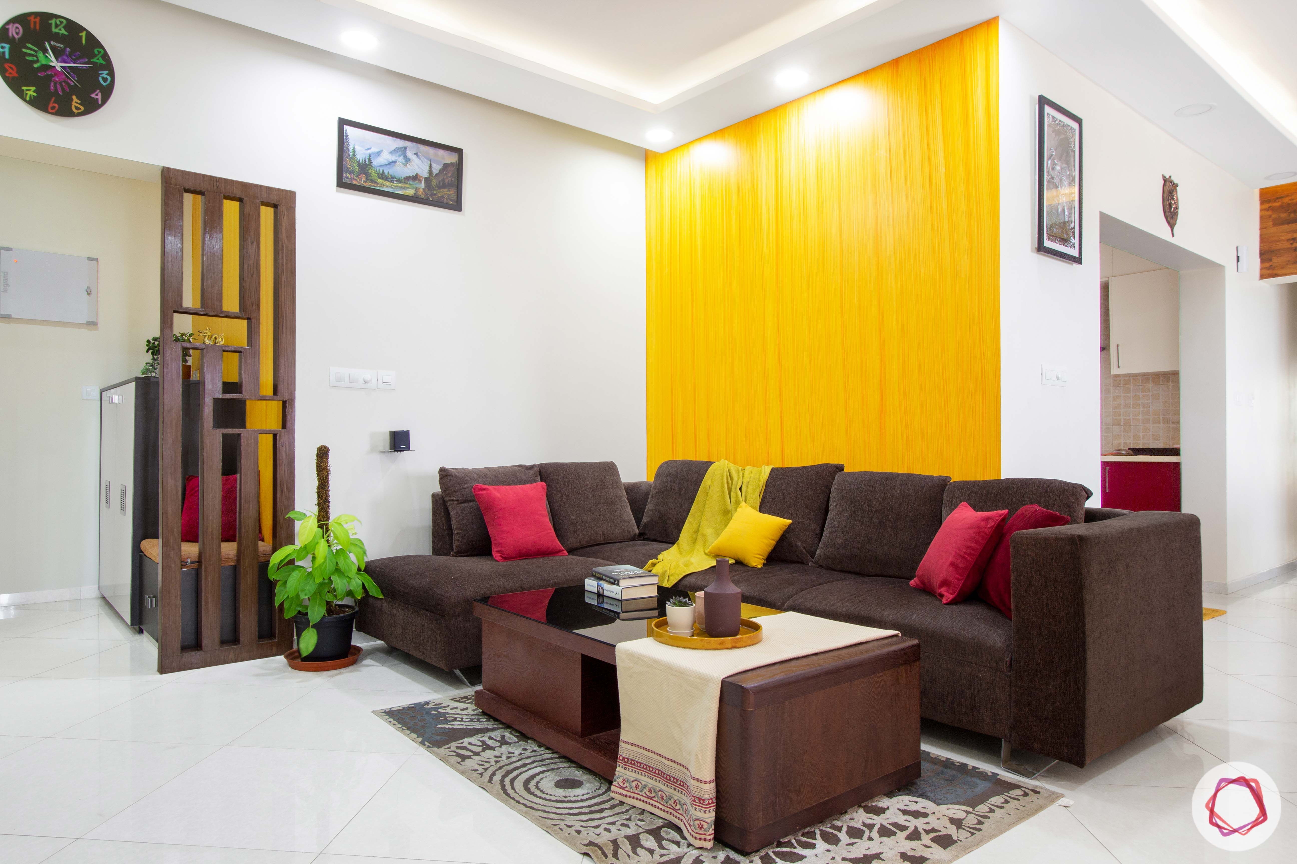 living-room-yellow-orange-textured-wall-sofa-pillows