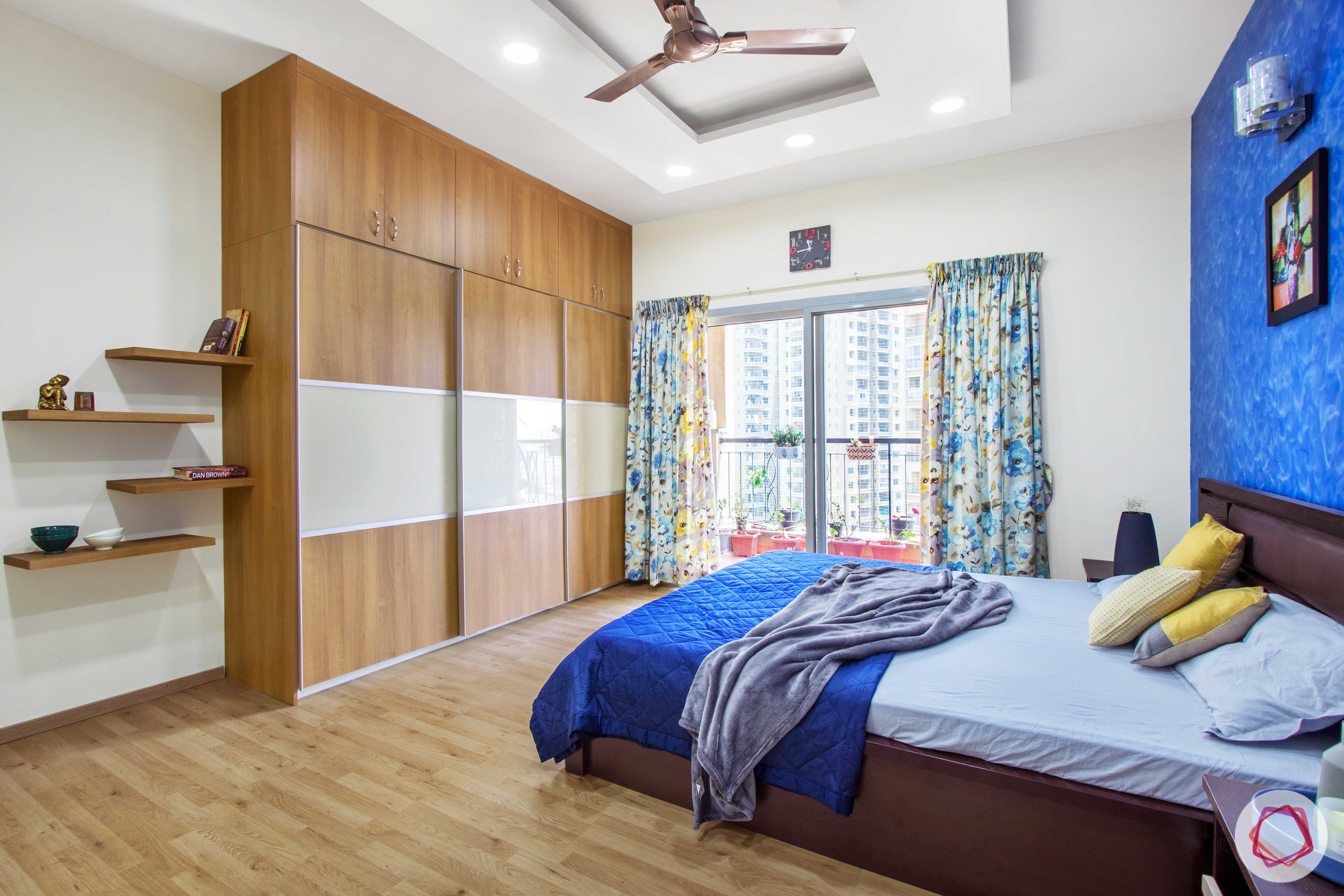 livspace-bangalore-master-bedroom-wardrobe-laminate-lacquered-glass