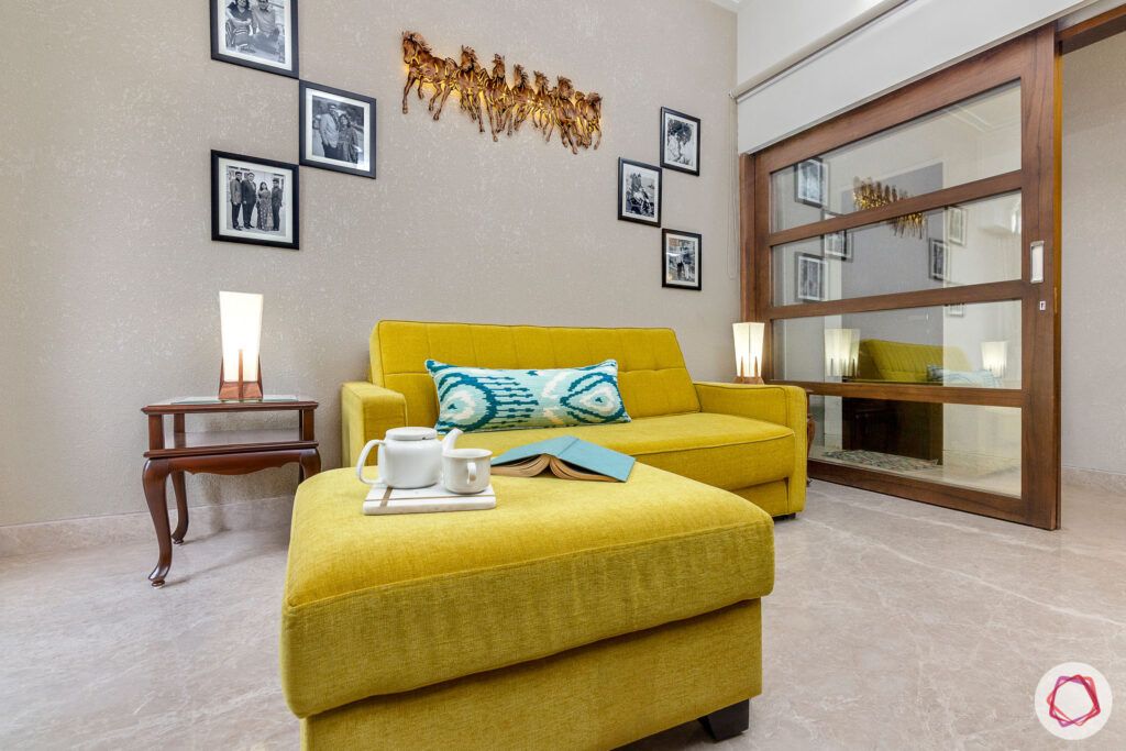 house-renovation-family-room-yellow-sofa-textured-wall