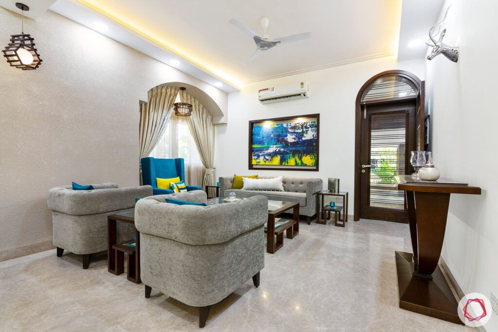 living-room-bucket-sofa-arched-curtains-false-ceiling