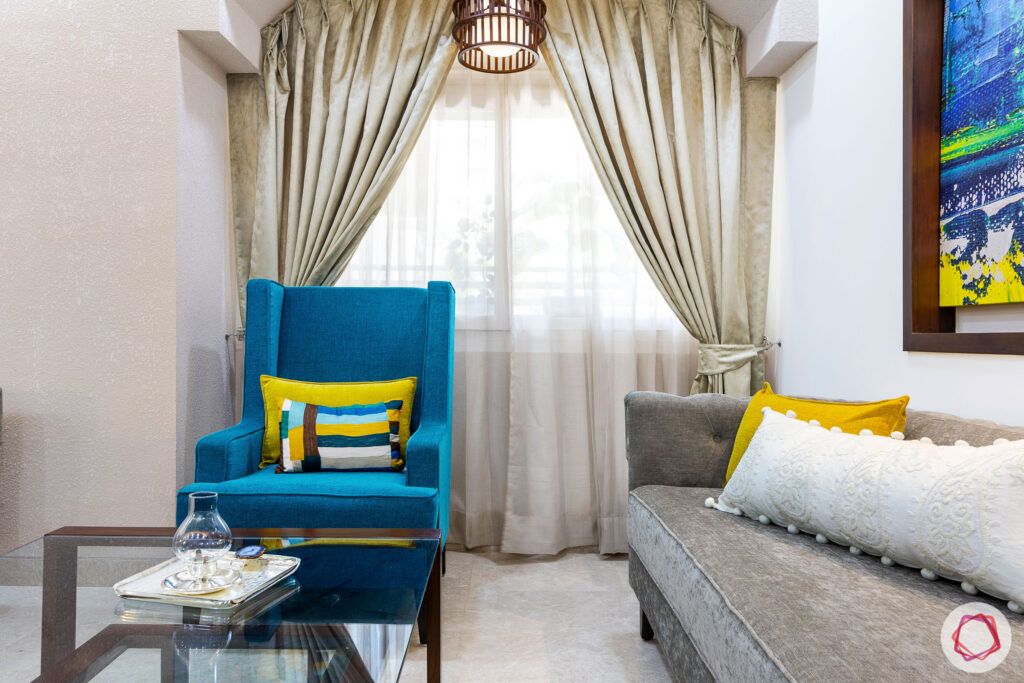 house-renovation-living-room-armchair-balcony-curtain