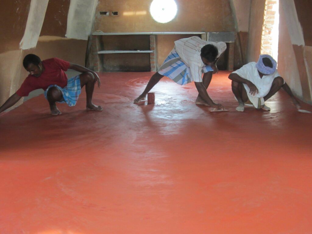 laying red oxide floor-shutterstock