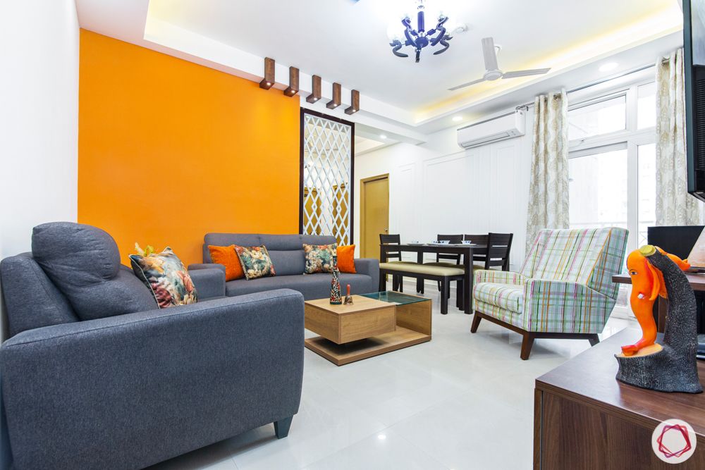 mahagun mywoods-livspace noida-living room-orange wall