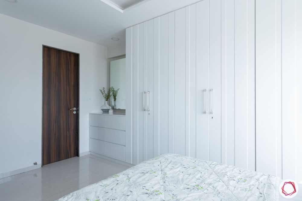 white wardrobe design-panelled doors-white bedroom