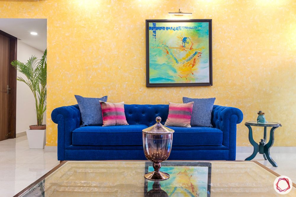 jal vayu vihar-yellow wall-blue sofa-side table