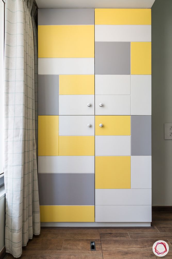 Interiors-in-Mumbai-storage-cabinet-yellow-grey