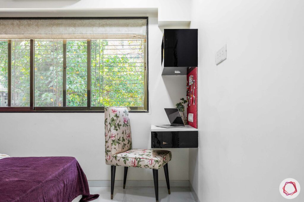 interior design company in mumbai-bedroom study nook-white study table-printed upholstery