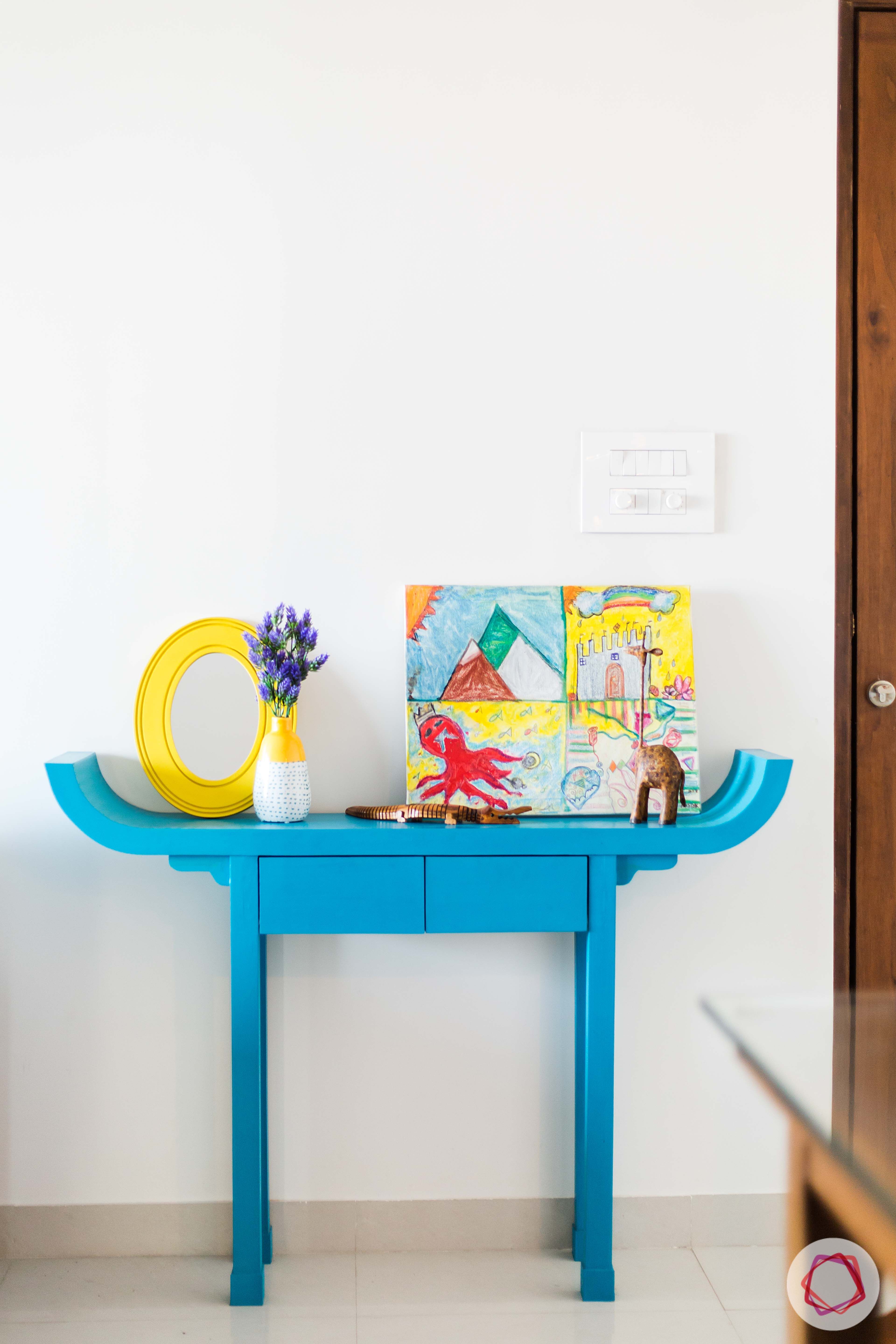 how to style a console table-blue-flower-vase-painting-artefacts