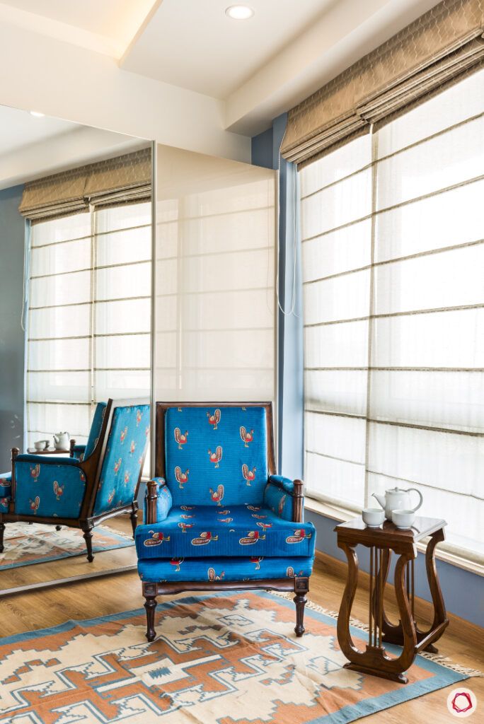 bookshelf-blue-chair-window