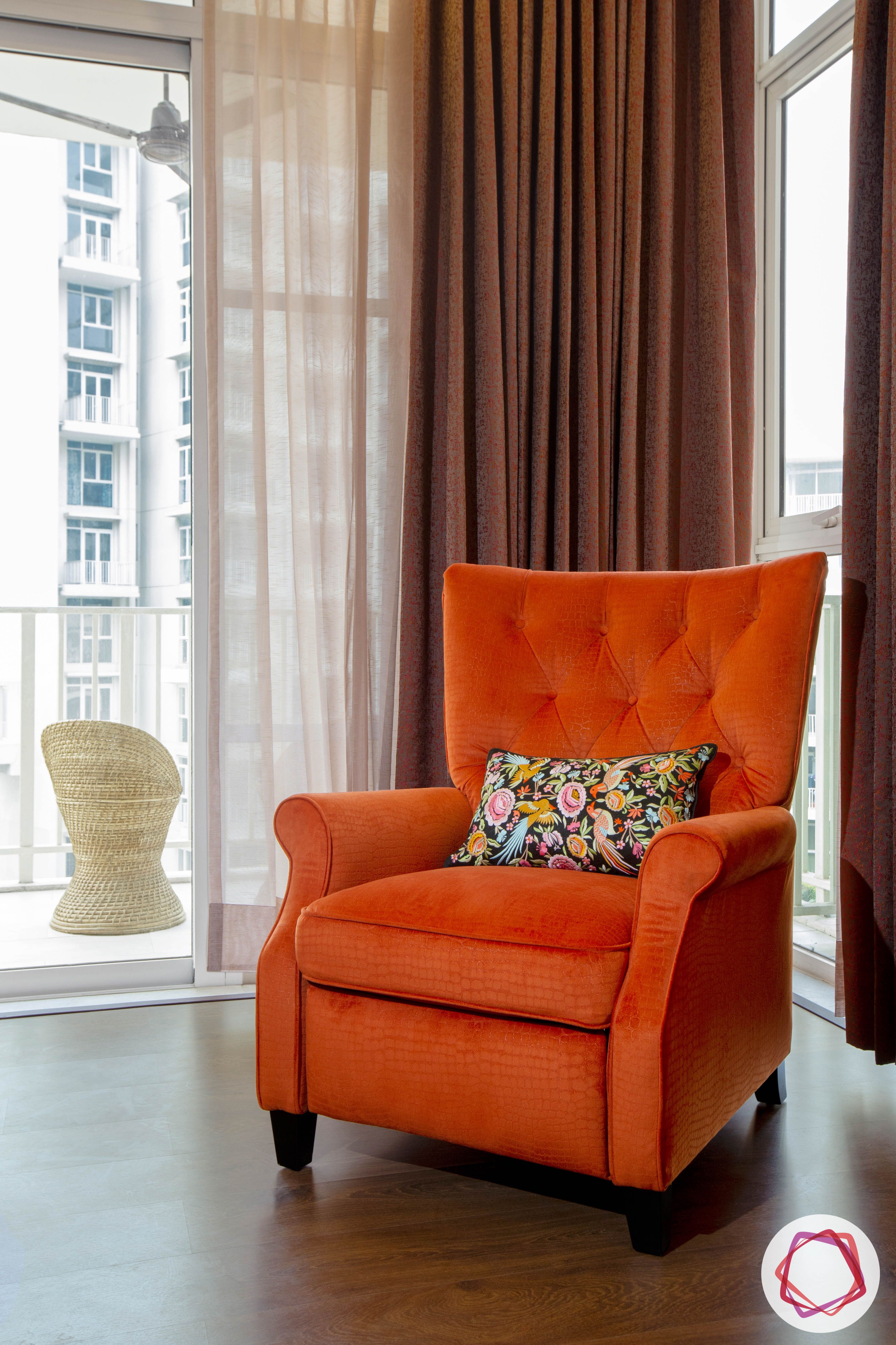 bookshelf-orange-chair-french-windows