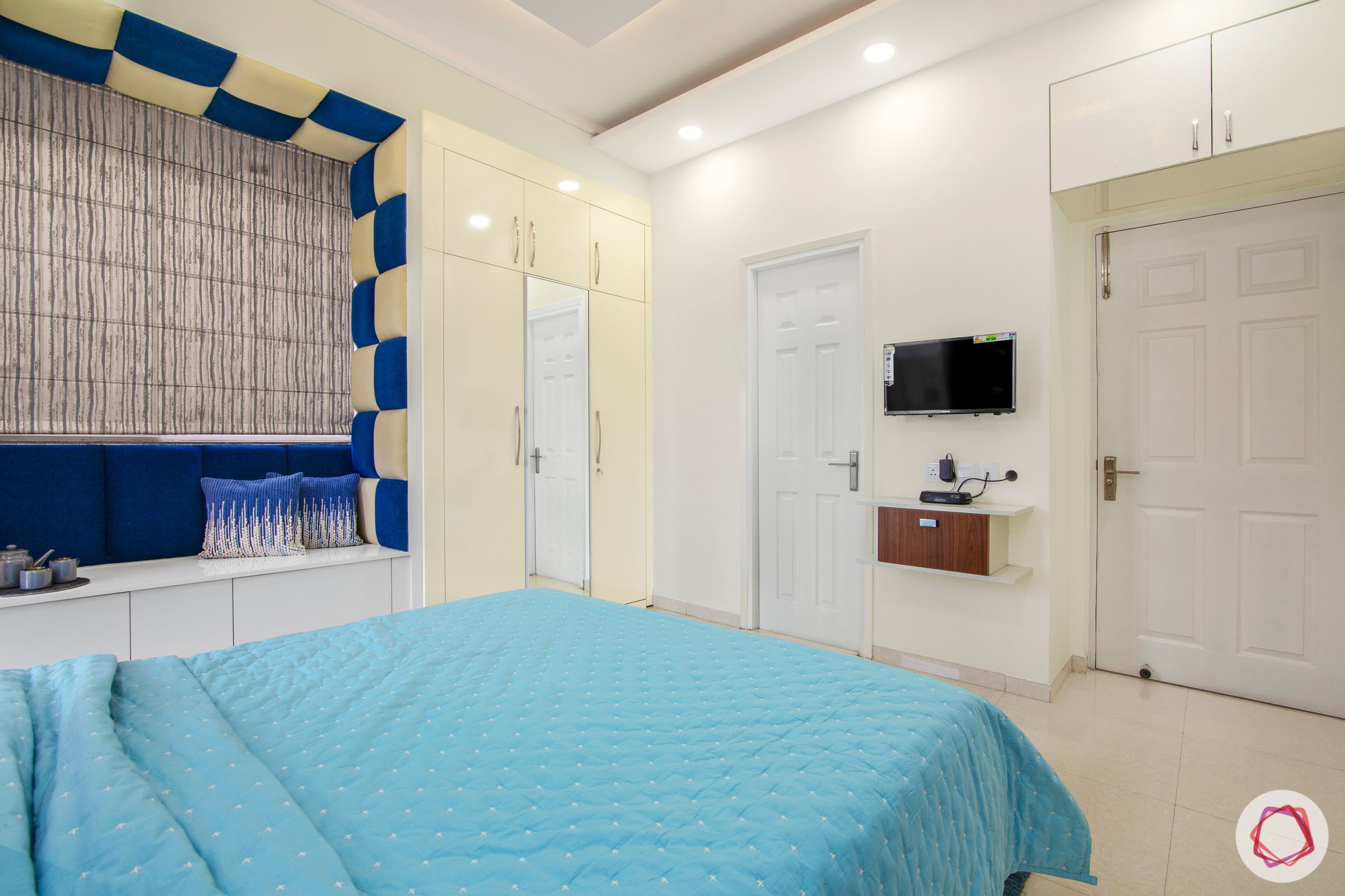 dasnac-blue bedroom-white wardrobes-bay seating