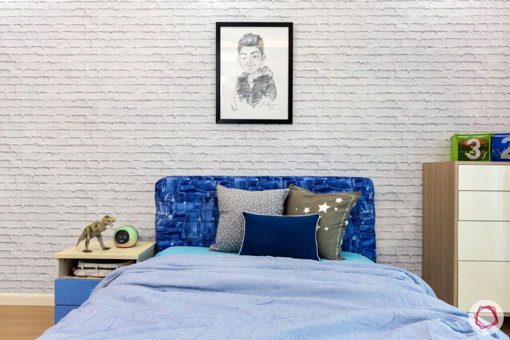 dlf park place-blue headboard-white brick wallpaper-side table