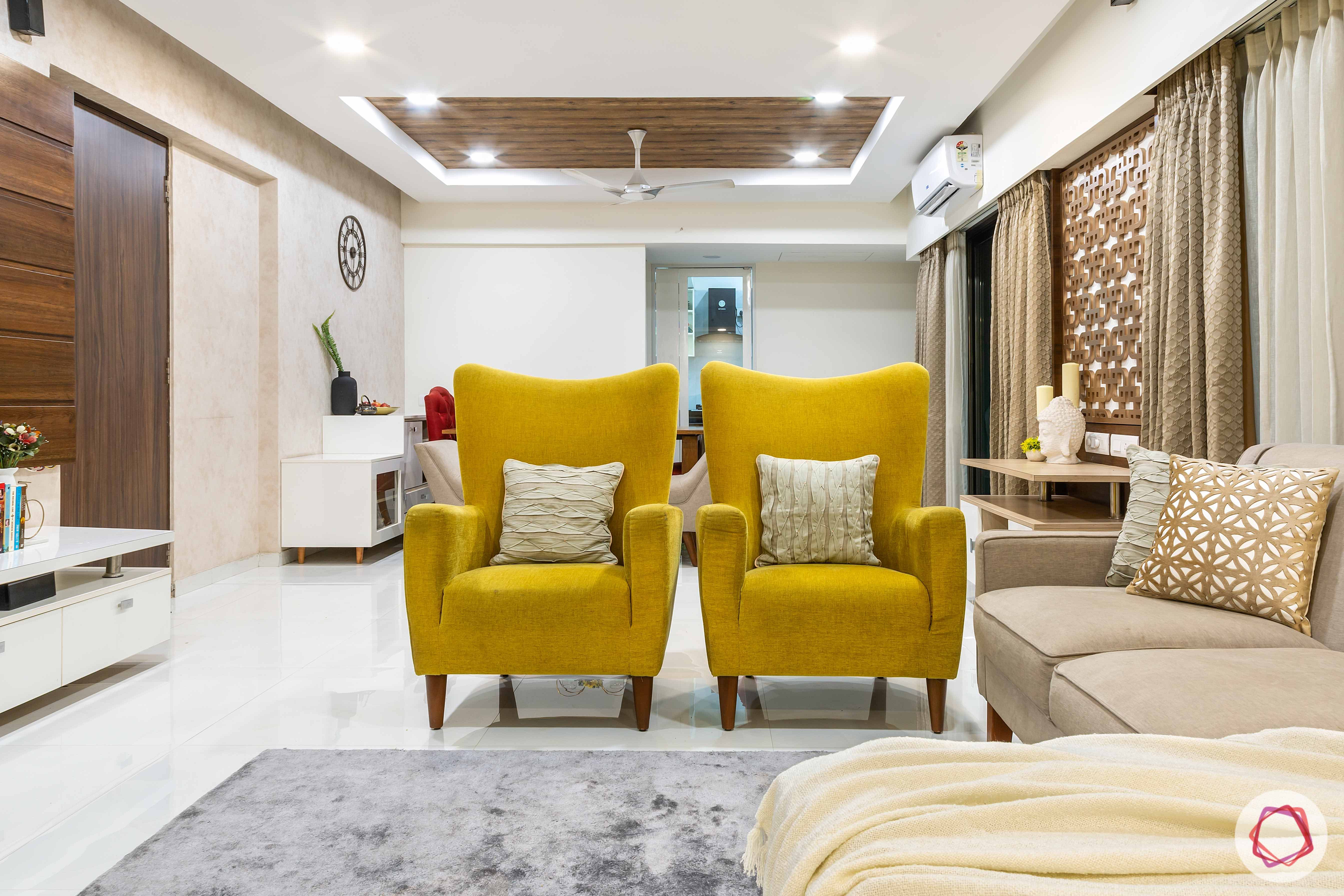 apartment interior design-living room-yellow accent chairs 