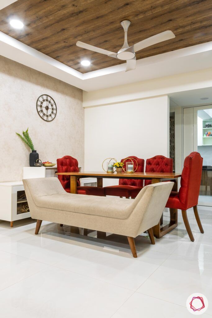 apartment interior design-dining room-bench-red chairs