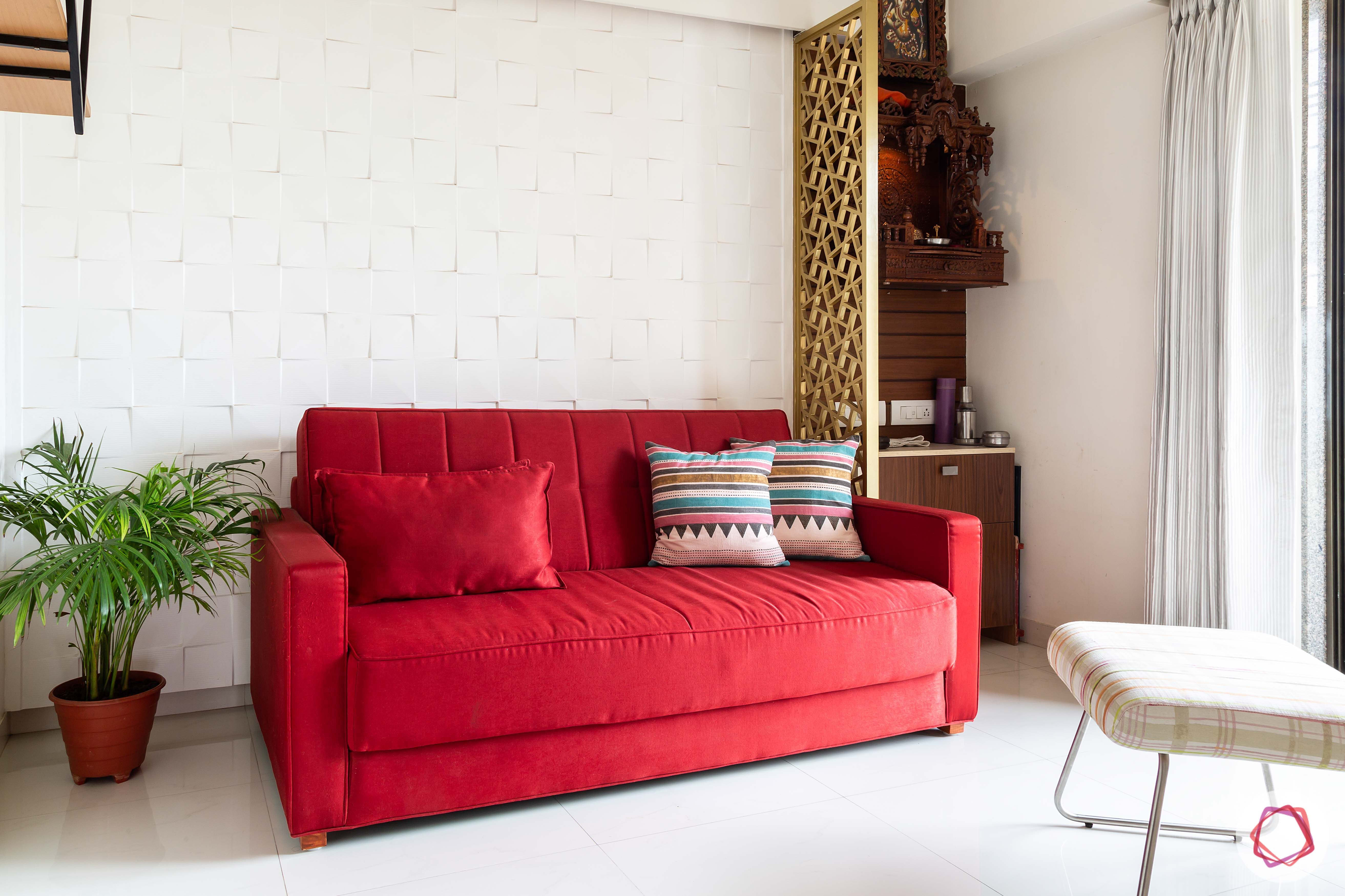 apartment interior design-entertainment room-red couch-pooja unit