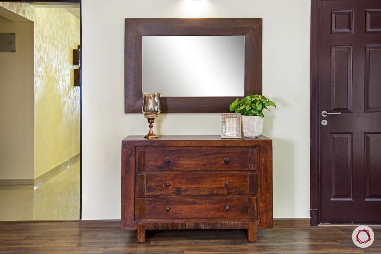 mahogany-wooden-chest-of-drawers-mirror-flooring-plant