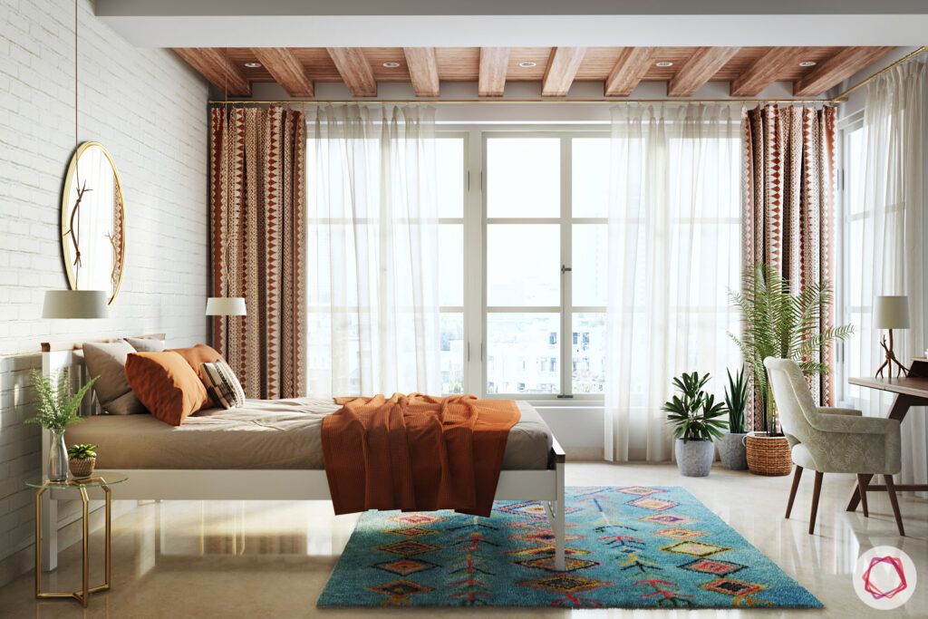 masaba gupta-bedroom-exposed brick wall-wooden rafters-white curtains