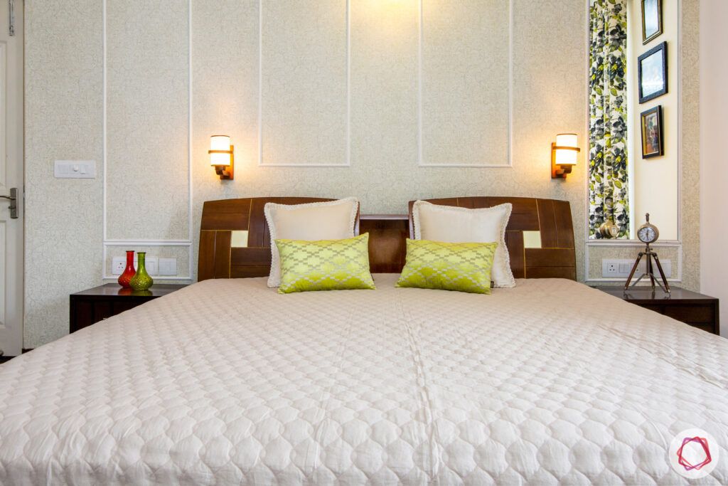 mapsko royale ville-wooden bed-pastel green wallpaper-textured wallpaper designs-wall sconces