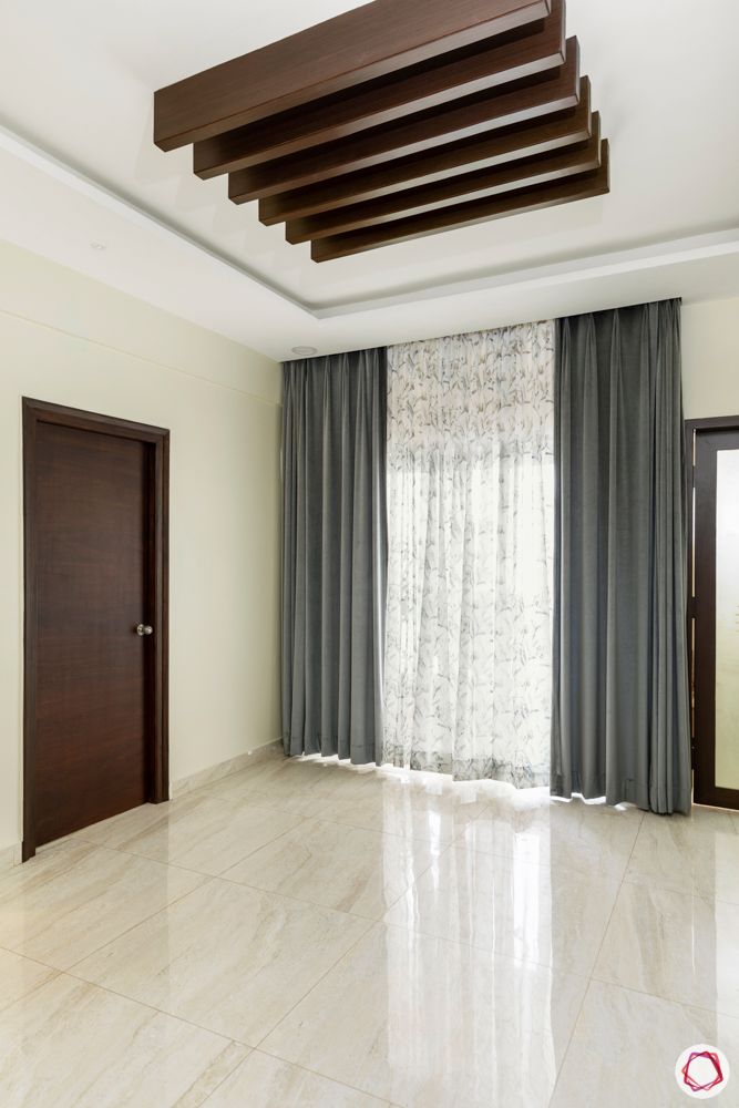 hallmark-tranquil-dining-room-wooden-rafters-white-floor-tiles-grey-curtains