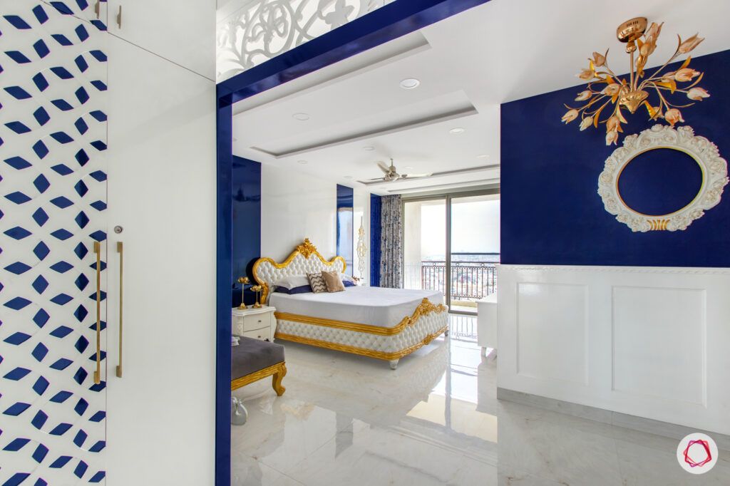 hiranandani bangalore-blue wall ideas-white wood carving