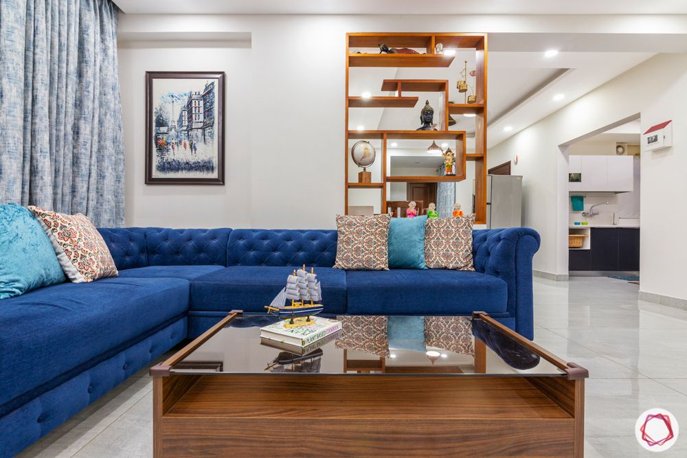 3bhk interior design-blue sofa design-laminate partition design