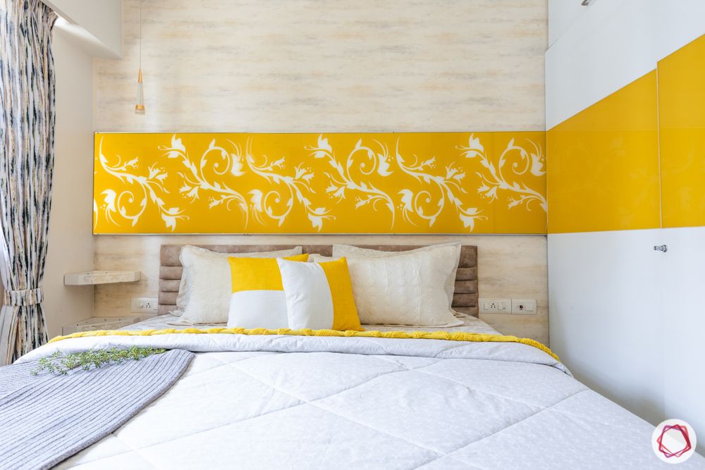 1-bhk-interior-design-bedroom-yellow back-painted panel