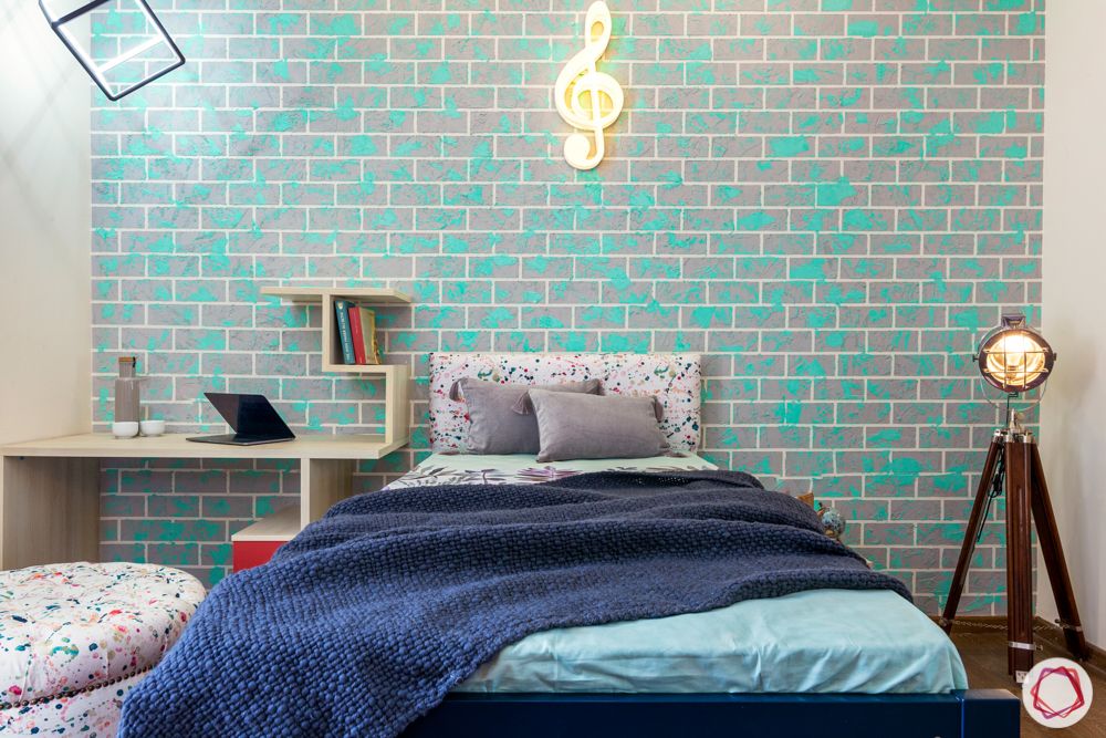  flat interior-teal blue texture paint wall-pull-out bed designs
