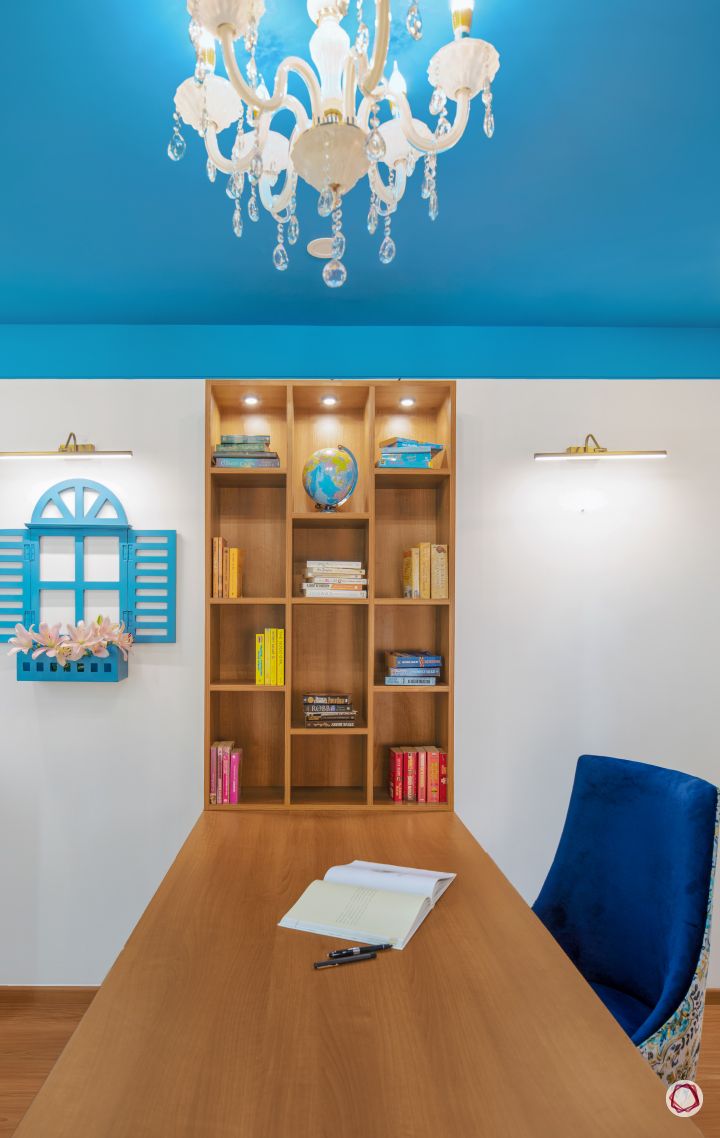 study room lighting-chandelier-painted ceiling-bookshelf-wooden flooring