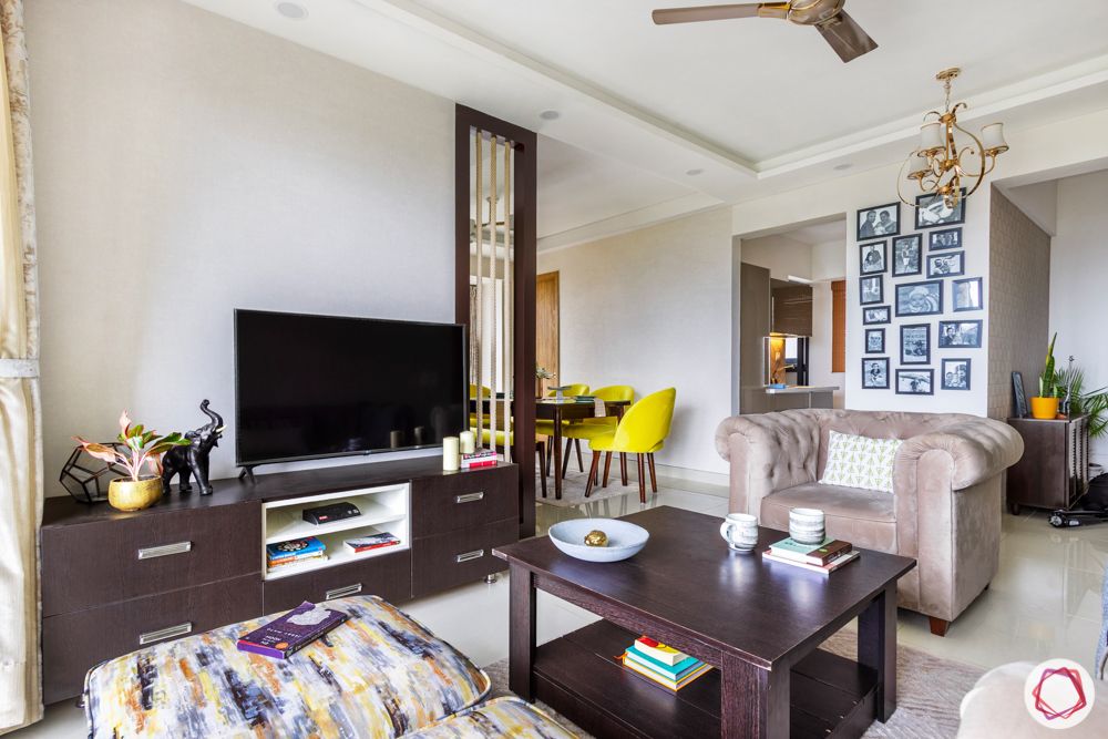 living room-tv unit-pink sofa-wooden tv unit-partition designs
