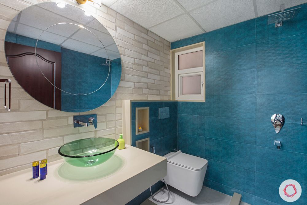 small bathroom ideas-blue bathroom wall-round mirror designs