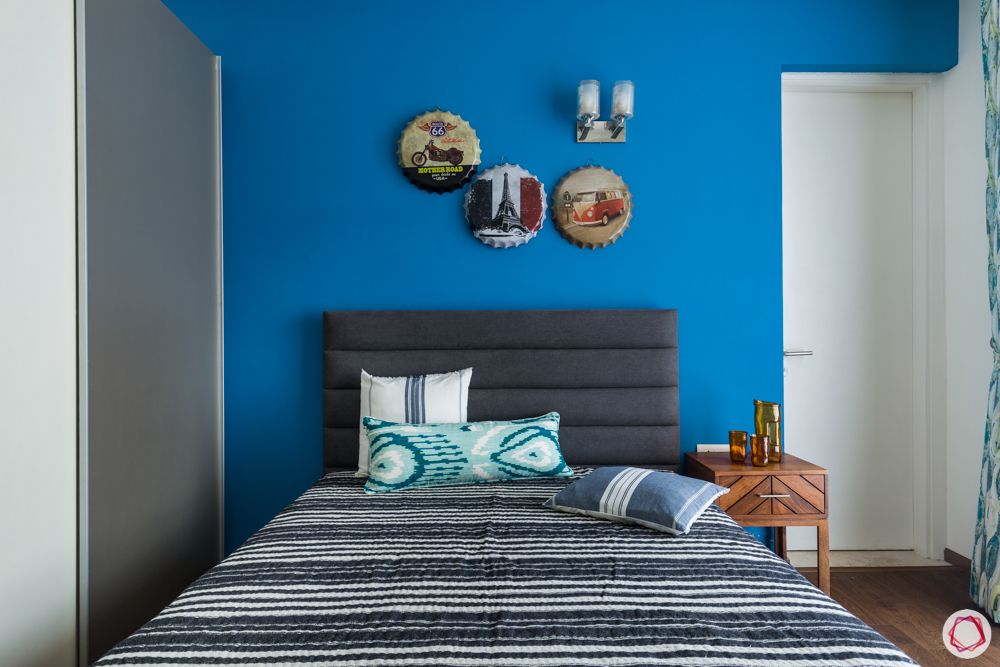 4 bhk apartment-grey headboard- blue and white wardrobe designs-blue walls-wall art