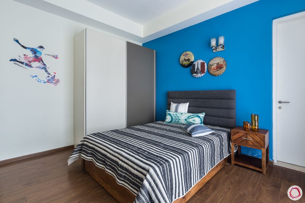 4 bhk apartment-grey headboard- blue and white wardrobe designs-blue walls-wall art