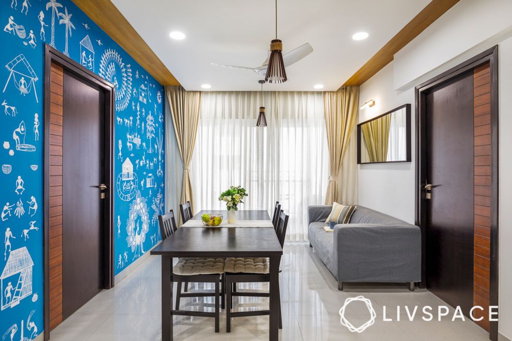 small-dining-room-design-and-living-room-with-blue-worli-accent-wall